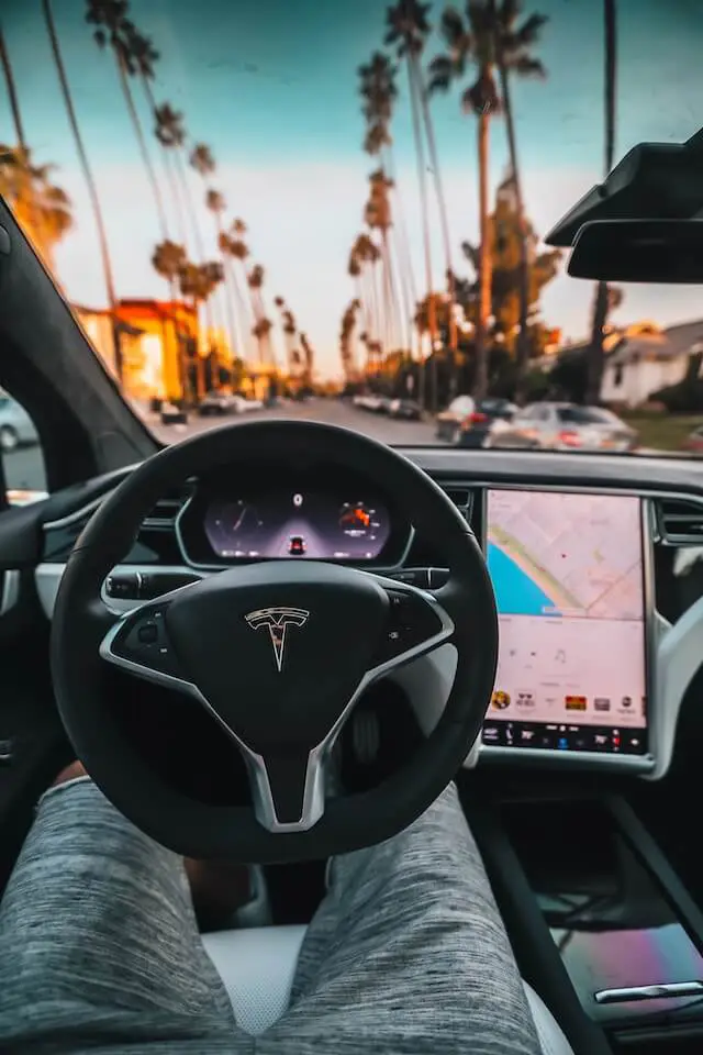 tesla we buy cars